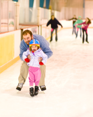 Father and Daughter at Ice Skating Rink